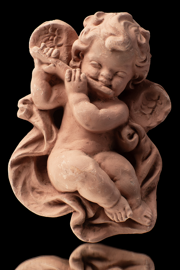 Angel con flauta