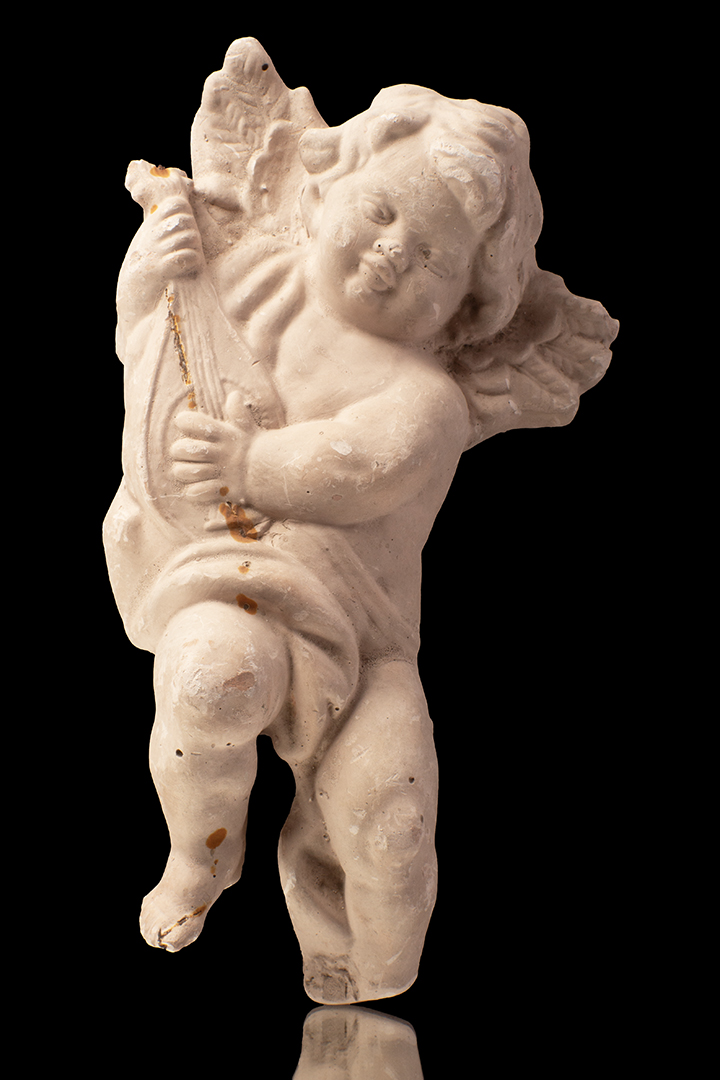 Ángel con instrumento