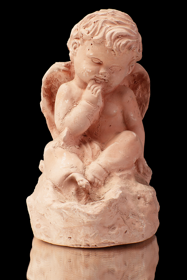 Ángel sentado