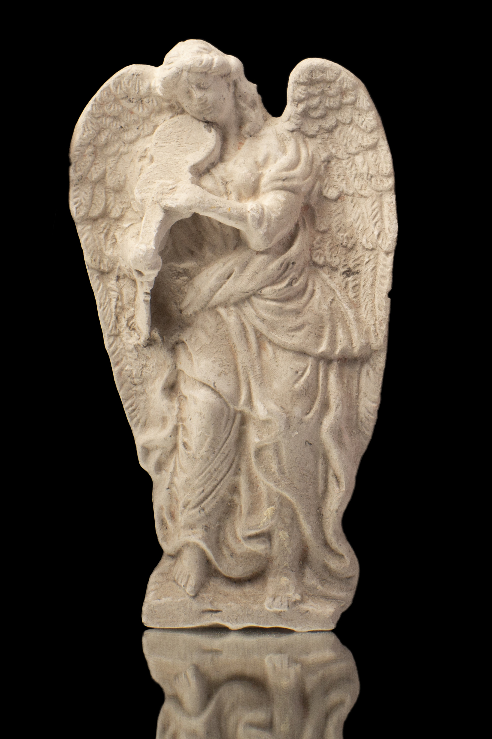 Ángel con instrumento