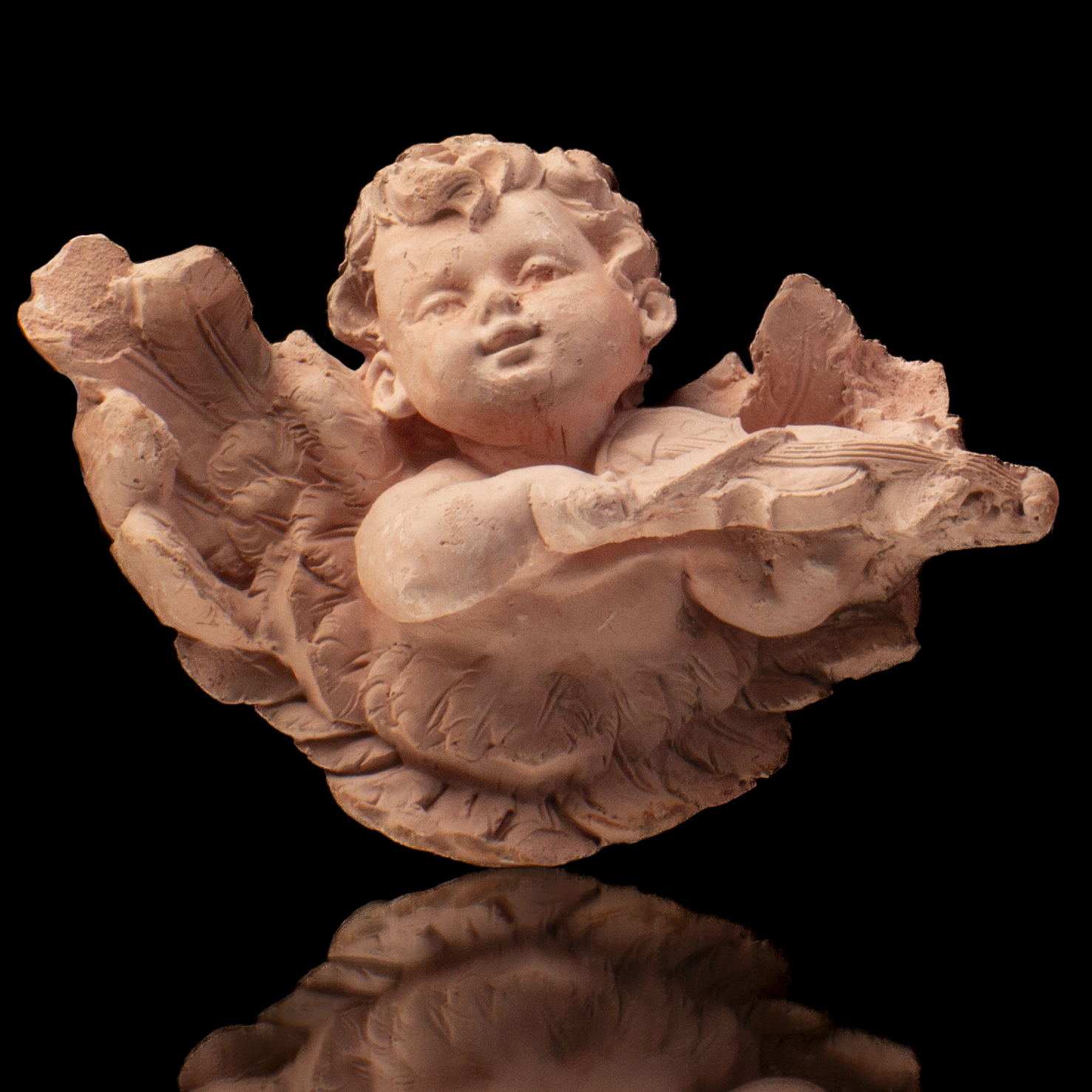 Ángel con instrumento