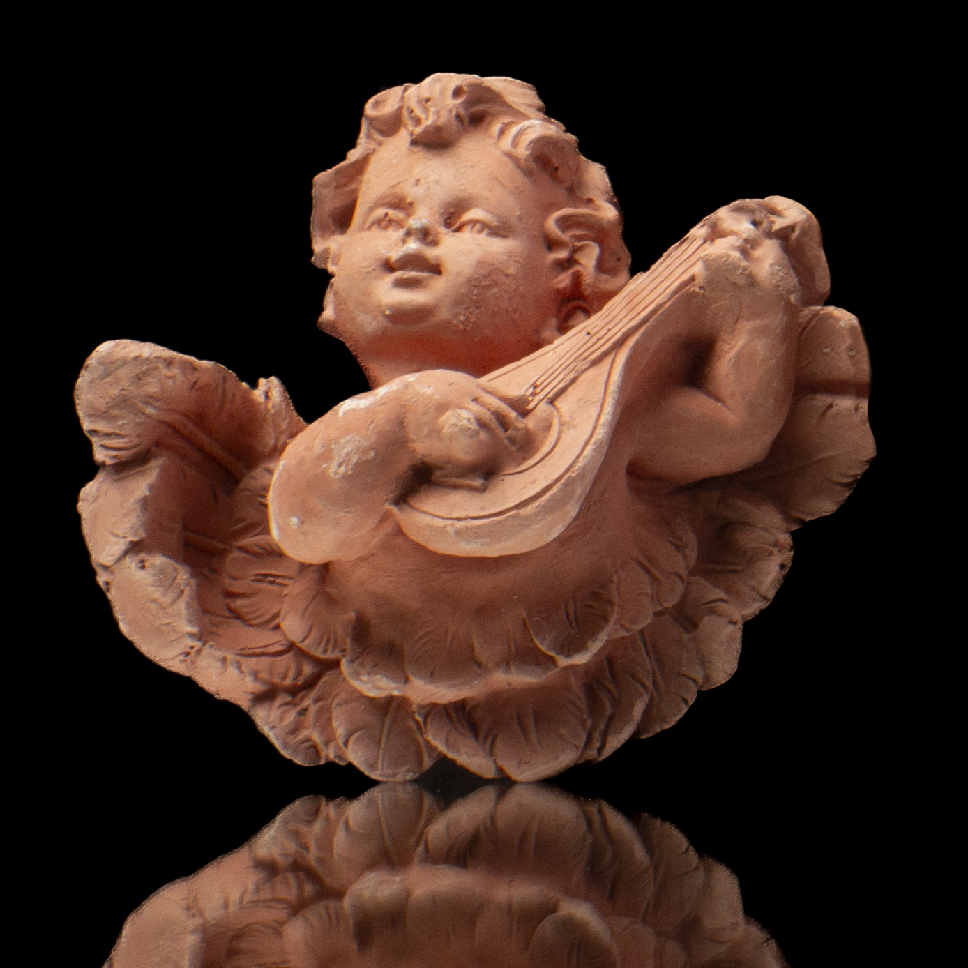 Ángel con instrumento