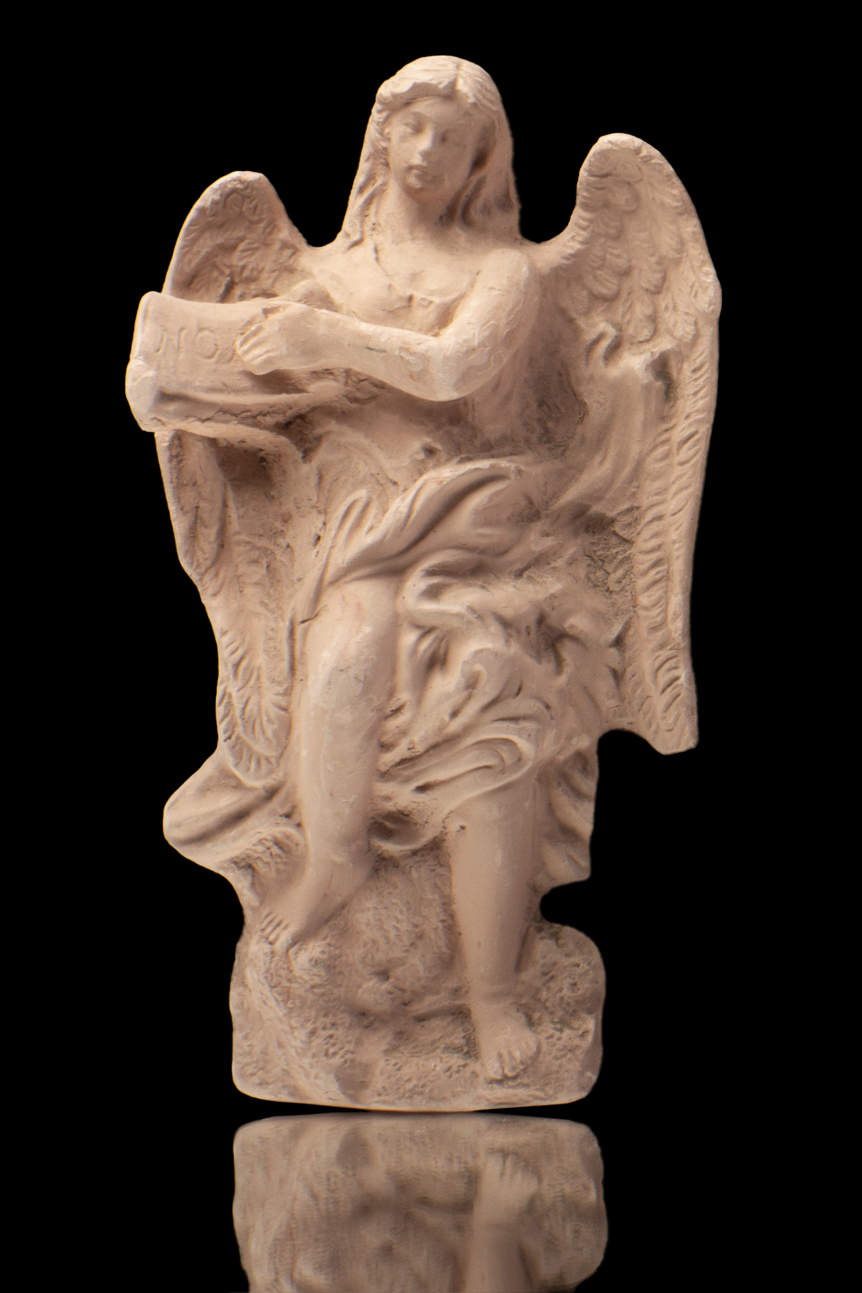 Ángel con instrumento