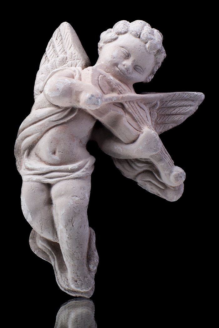Ángel con instrumento