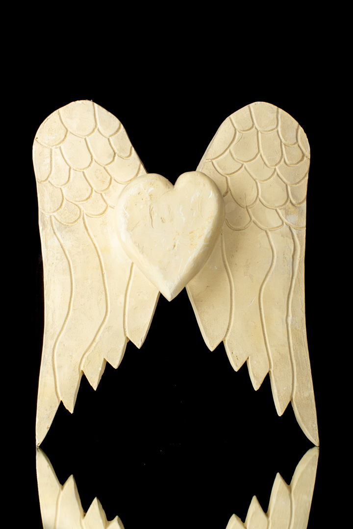 Corazón pequeño con alas