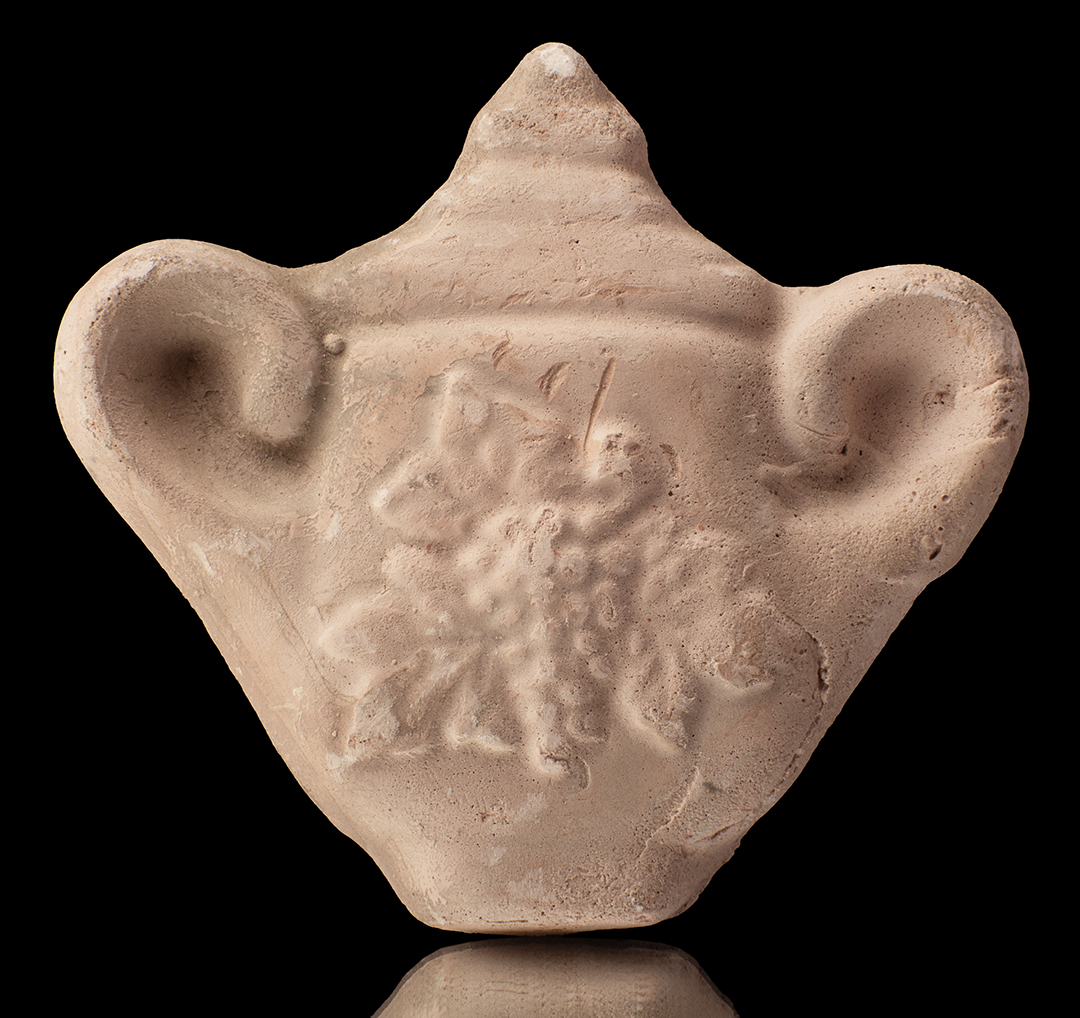 Tetera con uvas
