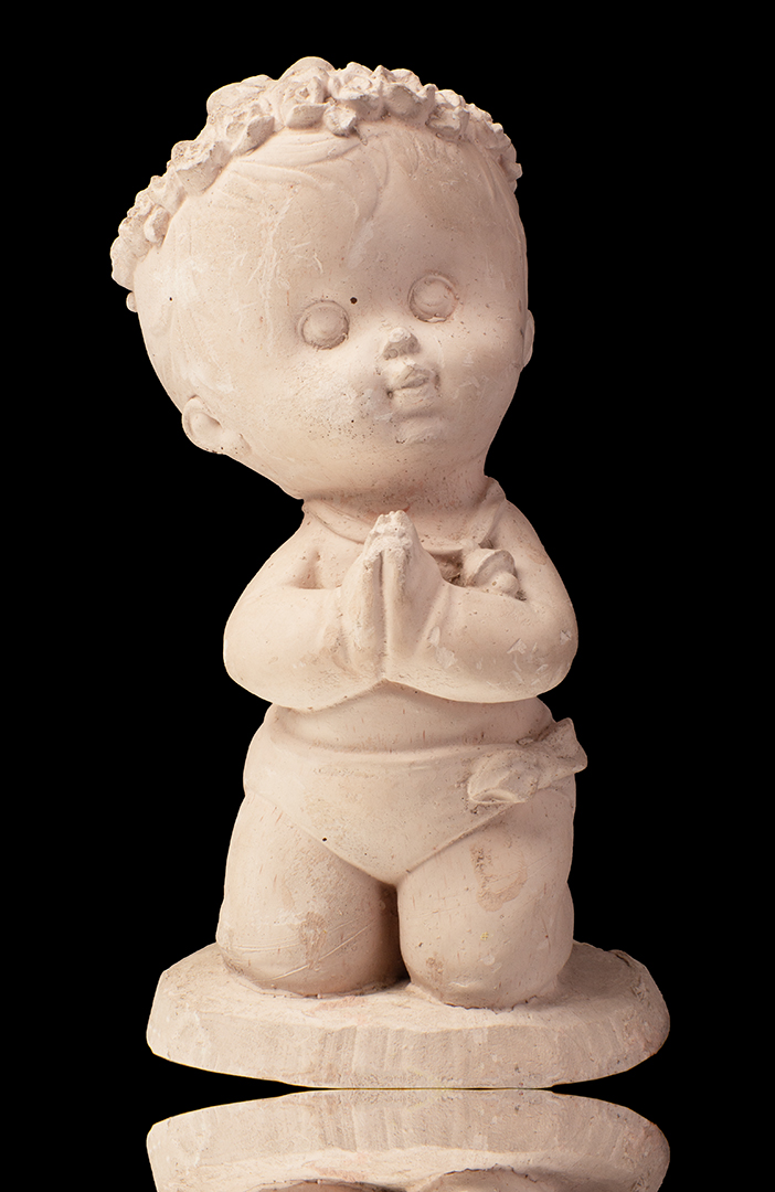 NIÑO REZANDO